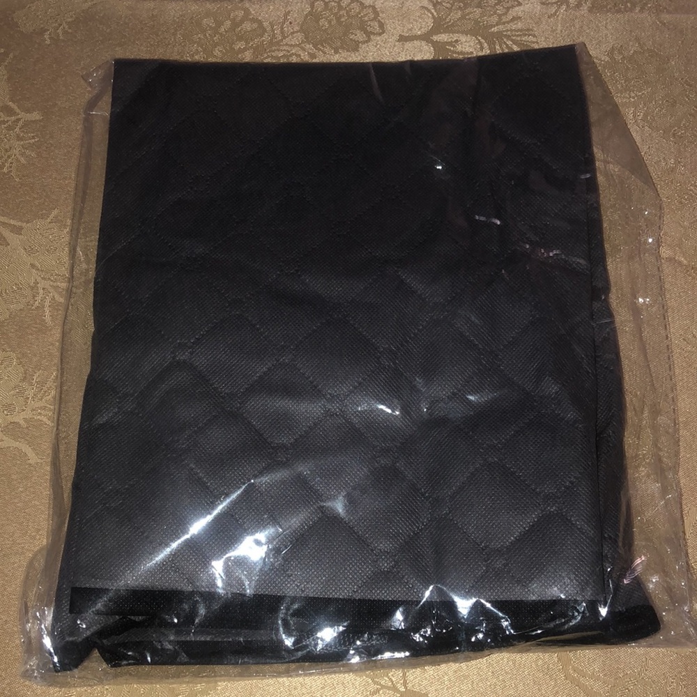 Brand new still in bag soft foldable storage tote for w/e you need to organize